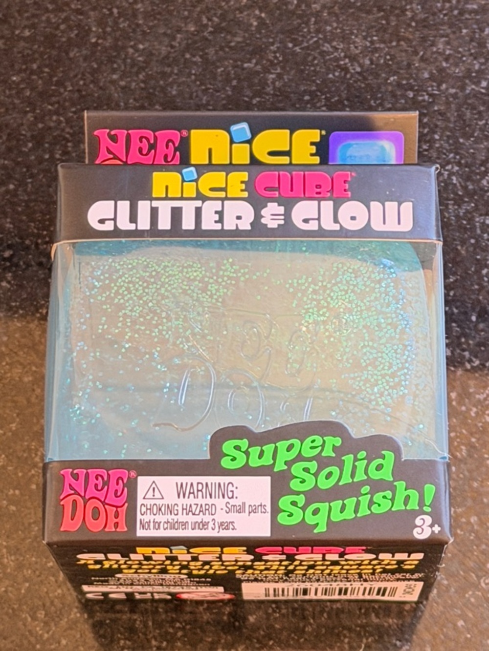 NIB 100% Auth NeeDoh Nice Cube Glitter & Glow Super Solid Squish - Blue